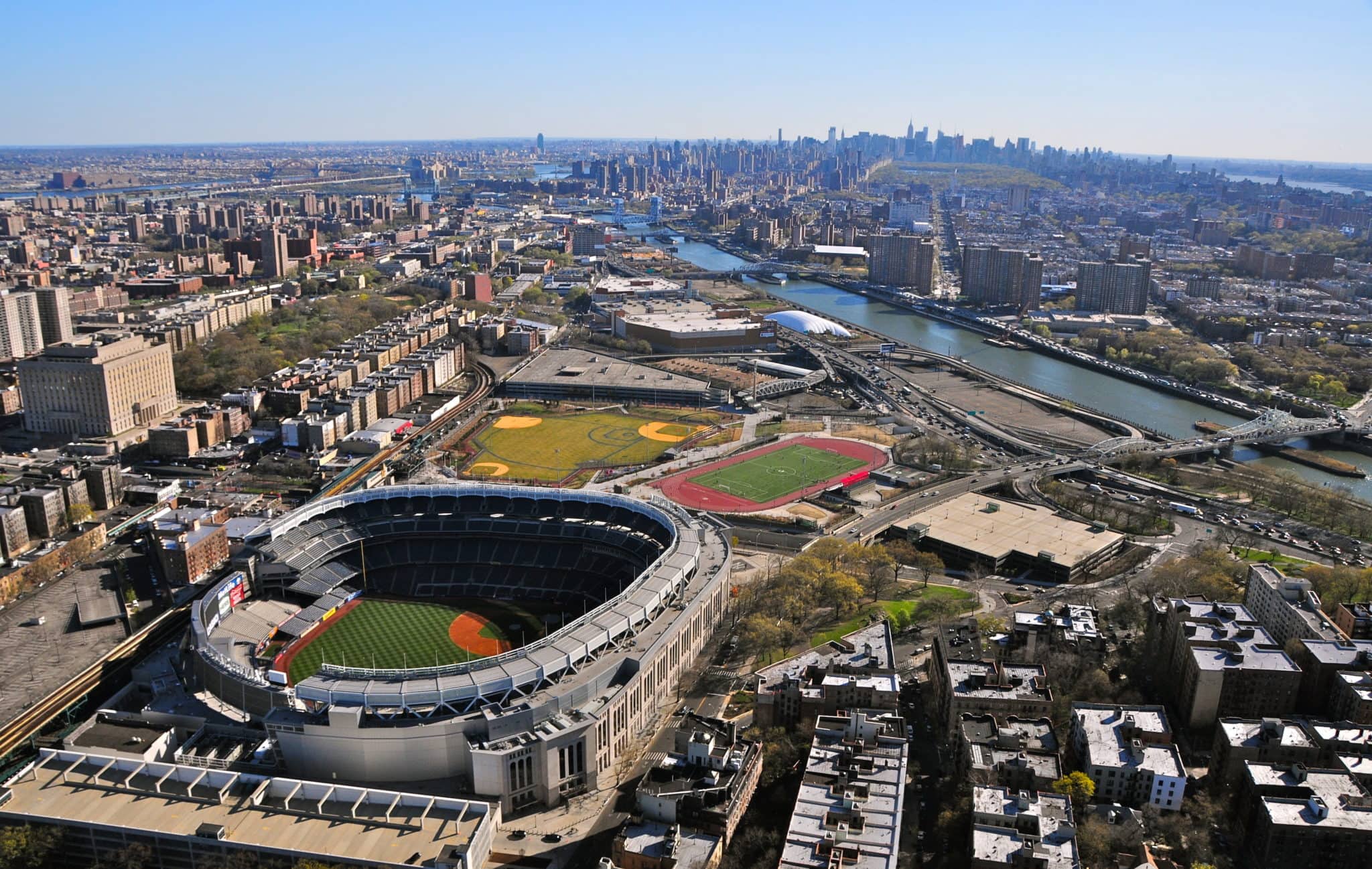 Aerial view of Yankee Stadium and surrounding Bronx neighborhood, representing property management services in the Bronx NYC.